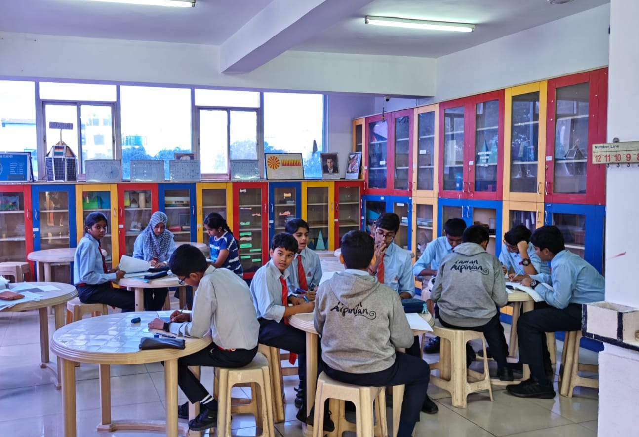 Alpine Public School classroom with students engaged in group activities at the Famous CBSE School in Jayanagar