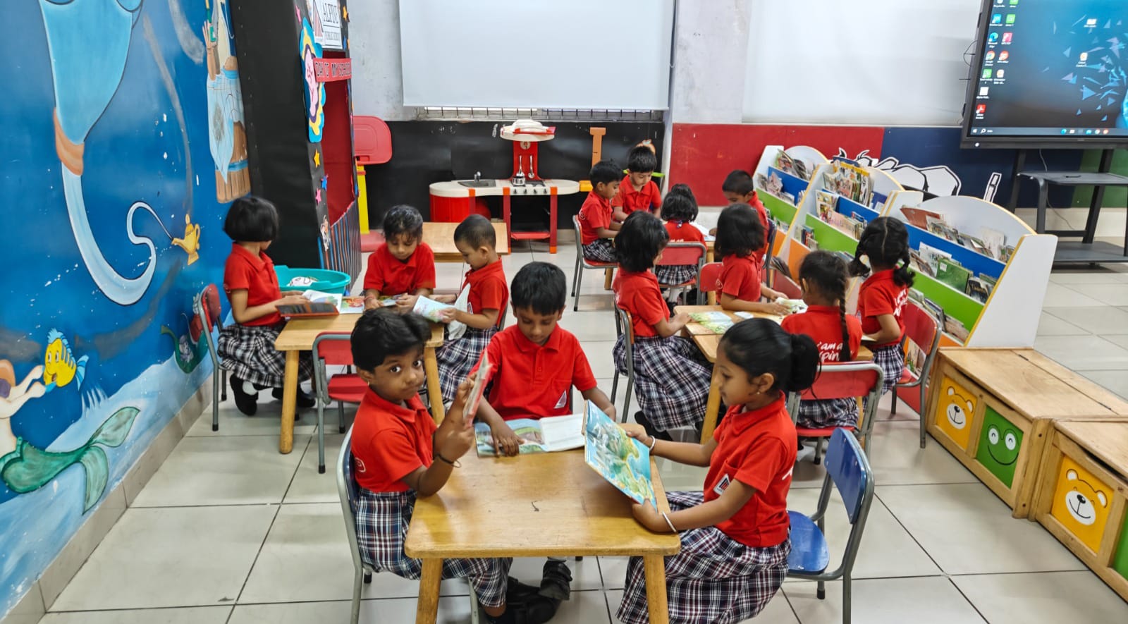 Students studying together in a classroom at Alpine Public School, the Best CBSE School in Jayanagar, highlighting a collaborative learning environment.