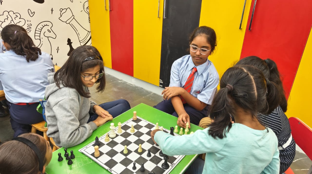 Students of Alpine Public School, the Leading CBSE School in Jayanagar, engaging in a chess activity that enhances critical thinking and strategy skills.